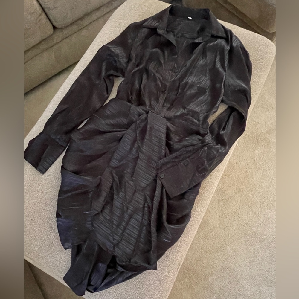 Black mini dress very elegant when on. Top is see through.